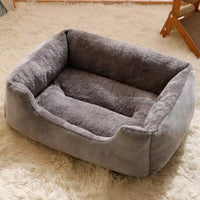 Pet bed in sage green with soft plush interior